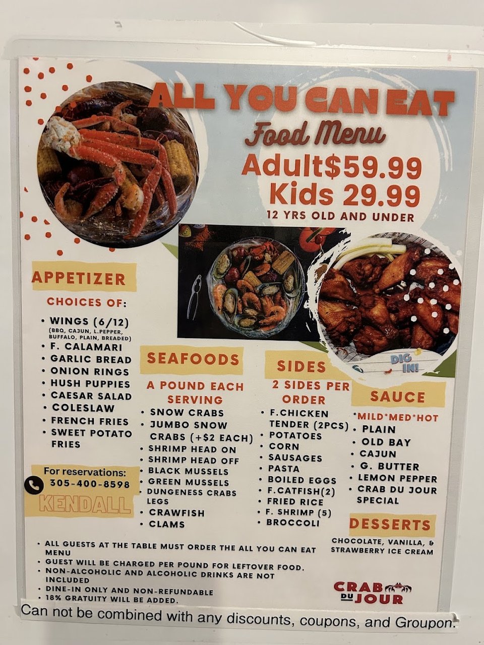 Printed menu with crab boils and grilled seafood.